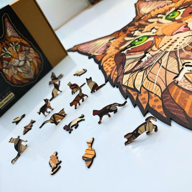 Unikalne elementy puzzli drewnianych w kształcie kotów - figurki zwierząt.